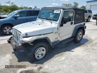 2004 Jeep Wrangler X with VIN 1J4FA39S74P763492, listed as a Copart auction lot 54664095 with 168,493 mi miles and Salvage Title. Bid and sale history available at DreamBid. Image 1.