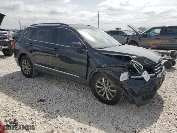 2018 Volkswagen Tiguan SEL with VIN 3VV3B7AX1JM055147, listed as a Copart auction lot 48154705 with 105,097 mi miles and Salvage Title. Bid and sale history available at carsss.com. Image 4.