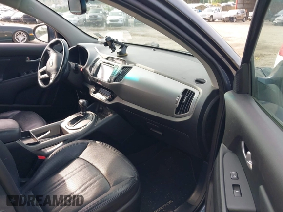2014 Kia Sportage SX with VIN KNDPC3A6XE7661835, listed as a IAAI auction lot 42480503 with 184,235 mi miles and . Bid and sale history available at DreamBid. Image 5.