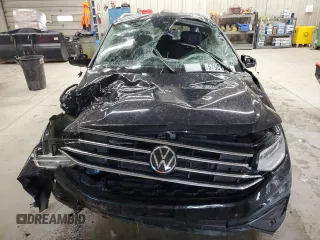2023 Volkswagen Tiguan SE with VIN 3VVMB7AX3PM021515, listed as a Copart auction lot 57981775 with 23,885 mi miles and Salvage title. Bid and sale history available at DreamBid. Image 5.