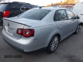 2009 Volkswagen Jetta Wolfsburg Edition with VIN 3VWRJ71K19M027857, listed as a IAAI auction lot 41312413 with 150,335 mi miles and . Bid and sale history available at DreamBid. Image 4.