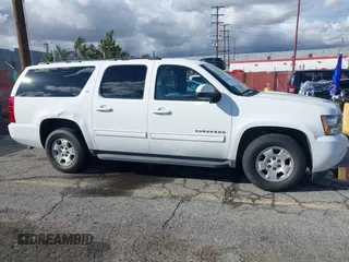 2010 Chevrolet Suburban LT with VIN 1GNUCJE05AR210539, listed as a IAAI auction lot 41805107 with 166,305 mi miles and . Bid and sale history available at DreamBid. Image 13.