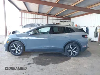2023 Volkswagen ID.4 S z VIN 1V25MPE84PC055981, wystawiony jako IAAI lot #41670418 z przebiegiem 15 634 mil mil oraz . Historia ofert i sprzedaży dostępna na DreamBid. Obrazek 14.