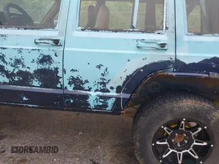 1997 Jeep Cherokee SE z VIN 1J4FJ28S3VL573144, wystawiony jako IAAI lot #41965201 z przebiegiem 298 276 mil mil oraz . Historia ofert i sprzedaży dostępna na DreamBid. Obrazek 19.