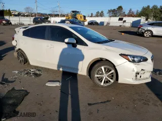 2020 Subaru Impreza Premium with VIN 4S3GKAV60L3612410, listed as a Copart auction lot 83670874 with 31,821 mi miles and Salvage Title. Bid and sale history available at carsss.com. Image 4.