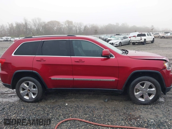 2013 Jeep Grand Cherokee Laredo with VIN 1C4RJEAG0DC516926, listed as a IAAI auction lot 41800254 with 259,006 mi miles. Bid and sale history available at carsss.com. Image 13.