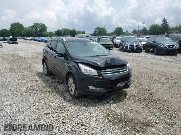 2015 Ford Escape Titanium with VIN 1FMCU9J91FUA38787, listed as a Copart auction lot 59749735 with 132,536 mi miles and Salvage title. Bid and sale history available at DreamBid. Image 14.