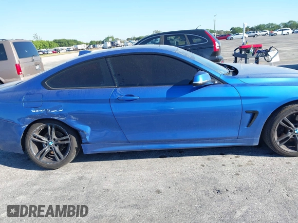2015 BMW 4 Series 428i xDrive with VIN WBA3N9C57FK247763, listed as a IAAI auction lot 41783892 with 158,813 mi miles and . Bid and sale history available at DreamBid. Image 13.