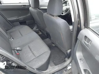 2012 Mitsubishi Lancer SE with VIN JA32V2FW9CU005808, listed as a IAAI auction lot 41920898 with 168,487 mi miles and . Bid and sale history available at DreamBid. Image 8.