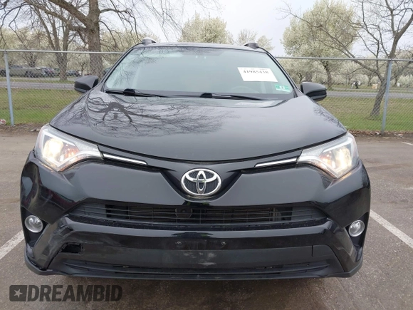 2016 Toyota RAV4 LE with VIN 2T3BFREV3GW447802, listed as a IAAI auction lot 41985438 with 213,247 mi miles. Bid and sale history available at carsss.com. Image 12.