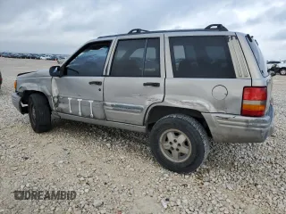 1998 Jeep Grand Cherokee with VIN 1J4FX48S6WC345358, listed as a Copart auction lot 85057454 with Not provided miles and Salvage title. Bid and sale history available at DreamBid. Image 2.