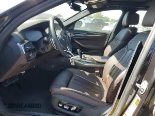 2020 BMW 5 Series with VIN WBAJB1C06LCD09913, listed as a Copart auction lot 71437384 with 5,544 mi miles and Salvage title. Bid and sale history available at DreamBid. Image 7.