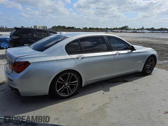 2013 BMW 7 Series 740Li with VIN WBAYE4C51DD137026, listed as a Copart auction lot 54016125 with 131,879 mi miles and Clean title. Bid and sale history available at DreamBid. Image 3.