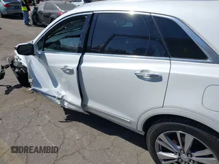2023 Cadillac XT5 AWD Premium Luxury with VIN 1GYKNDRS4PZ195431, listed as a IAAI auction lot 41714459 with 13,207 mi miles and . Bid and sale history available at DreamBid. Image 17.