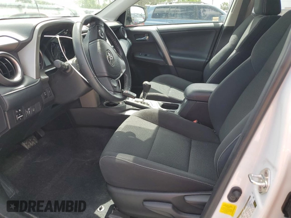 2018 Toyota RAV4 XLE with VIN 2T3RFREV1JW843426, listed as a Copart auction lot 52283125 with 12,809 mi miles and Salvage Title. Bid and sale history available at DreamBid. Image 7.