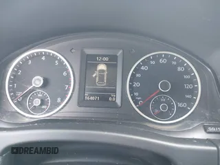 2013 Volkswagen Tiguan SE z VIN WVGBV7AX3DW552606, wystawiony jako IAAI lot #42174927 z przebiegiem 164 071 mil mil oraz . Historia ofert i sprzedaży dostępna na DreamBid. Obrazek 7.