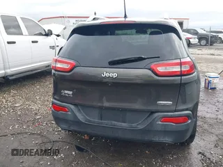 2014 Jeep Cherokee Altitude with VIN 1C4PJMCB7EW232678, listed as a IAAI auction lot 40812147 with 105,828 mi miles. Bid and sale history available at carsss.com. Image 17.