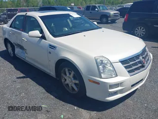 2008 Cadillac STS RWD z VIN 1G6DZ67A580168157, wystawiony jako IAAI lot #42133003 z przebiegiem 133 928 mil mil oraz . Historia ofert i sprzedaży dostępna na DreamBid. Obrazek 1.
