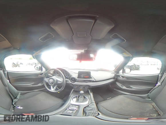 2021 Mazda MX-5 Miata Sport с VIN JM1NDAB78M0454772, выставлен на аукционе Copart как лот 63319665 с пробегом 58 373 миль миль и Списание • Salvage title. История ставок и продаж доступна на DreamBid. Изображение 14.