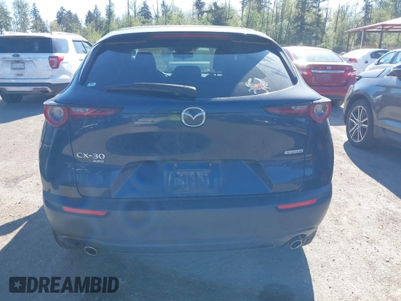 2020 Mazda CX-30 Select with VIN 3MVDMBCL4LM140110, listed as a IAAI auction lot 42194090 with 33,965 mi miles and . Bid and sale history available at DreamBid. Image 17.