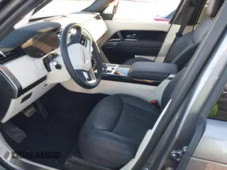 2023 Land Rover Range Rover SE z VIN SALKP9E78PA086430, wystawiony jako IAAI lot #41336935 z przebiegiem 7 831 mil mil oraz . Historia ofert i sprzedaży dostępna na DreamBid. Obrazek 5.