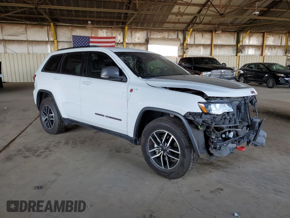 2020 Jeep Grand Cherokee Trailhawk with VIN 1C4RJFLGXLC400313, listed as a Copart auction lot 53649565 with 51,717 mi miles and Salvage title. Bid and sale history available at DreamBid. Image 4.