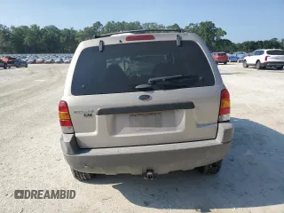 2001 Ford Escape XLT с VIN 1FMCU04131KC39323, выставлен на аукционе Copart как лот 57726825 с пробегом 170 104 миль миль и Списание • Salvage title. История ставок и продаж доступна на DreamBid. Изображение 6.