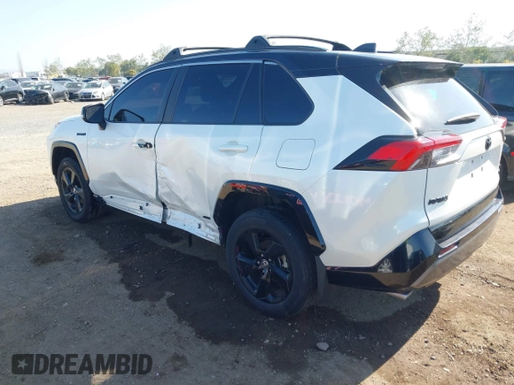 2021 Toyota RAV4 Hybrid XSE with VIN 4T3E6RFV3MU042773, listed as a IAAI auction lot 42000073 with 55,110 mi miles and . Bid and sale history available at DreamBid. Image 3.