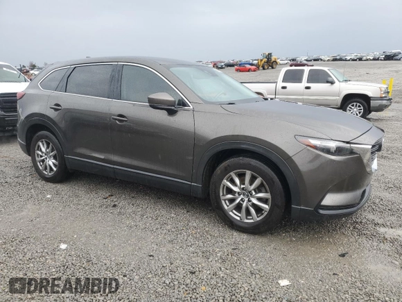 2017 Mazda CX-9 Touring with VIN JM3TCBCY0H0133586, listed as a Copart auction lot 50993075 with 103,125 mi miles and Salvage title. Bid and sale history available at DreamBid. Image 4.