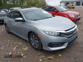2018 Honda Civic Sedan EX with VIN 19XFC2F72JE034905, listed as a IAAI auction lot 40464574 with 68,942 mi miles. Bid and sale history available at carsss.com. Image 1.