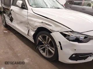 2016 BMW 3 Series 328i with VIN WBA8E9G5XGNT85247, listed as a IAAI auction lot 41578238 with 64,951 mi miles. Bid and sale history available at carsss.com. Image 6.