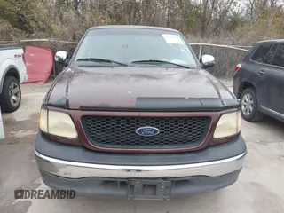 2001 Ford F-150 XL with VIN 2FTRX07W31CA59129, listed as a IAAI auction lot 41349352 with 272,026 mi miles. Bid and sale history available at carsss.com. Image 6.