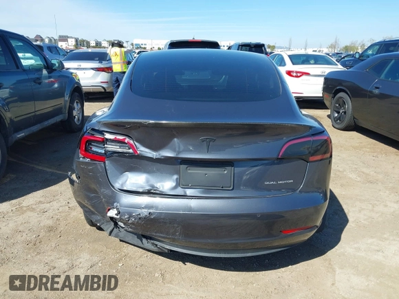 2021 Tesla Model 3 Long Range with VIN 5YJ3E1EB9MF997442, listed as a IAAI auction lot 41759875 with 87,059 mi miles. Bid and sale history available at carsss.com. Image 15.