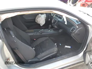 2014 Chevrolet Camaro LS с VIN 2G1FA1E31E9244116, выставлен на аукционе IAAI как лот 41785264 с пробегом 96 936 миль миль и . История ставок и продаж доступна на DreamBid. Изображение 5.