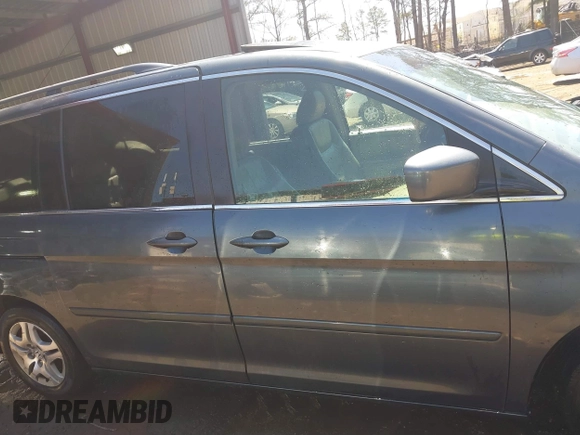 2005 Honda Odyssey EX-L with VIN 5FNRL387X5B069823, listed as a IAAI auction lot 41883007 with 267,250 mi miles and . Bid and sale history available at DreamBid. Image 13.
