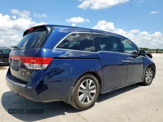 2014 Honda Odyssey Touring with VIN 5FNRL5H97EB037439, listed as a Copart auction lot 62782035 with 153,315 mi miles and Salvage title. Bid and sale history available at DreamBid. Image 3.