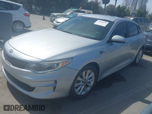 2018 Kia Optima LX with VIN 5XXGT4L31JG267716, listed as a IAAI auction lot 41890611 with 63,491 mi miles and . Bid and sale history available at carsss.com. Image 2.