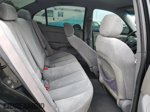 2004 Hyundai Elantra GLS z VIN KMHDN46D14U812275, wystawiony jako Copart lot #54163945 z przebiegiem 209 400 mil mil oraz Szkoda całkowita • Salvage title. Historia ofert i sprzedaży dostępna na DreamBid. Obrazek 10.