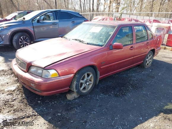1998 Volvo S70 with VIN YV1LS5545W1452779, listed as a IAAI auction lot 41806870 with 142,224 mi miles. Bid and sale history available at carsss.com. Image 2.