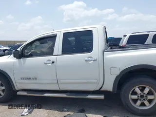 2012 Nissan Titan SL with VIN 1N6BA0EC1CN326919, listed as a IAAI auction lot 42630368 with 230,215 mi miles and . Bid and sale history available at DreamBid. Image 14.