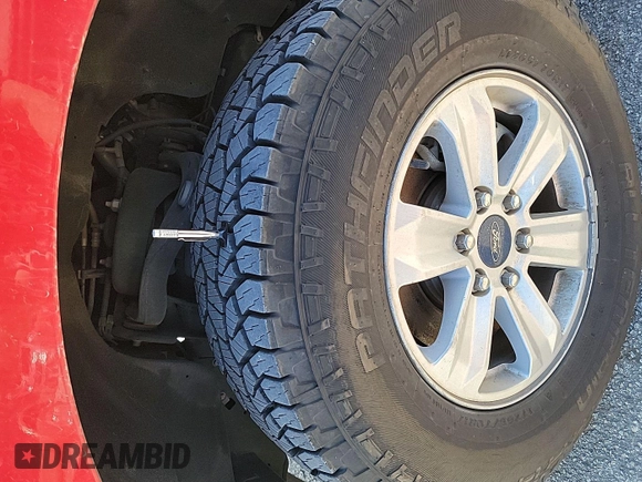 2020 Ford F-150 XL with VIN 1FTEW1E41LKE81388, listed as a IAAI auction lot 42715664 with 113,099 mi miles and . Bid and sale history available at DreamBid. Image 24.
