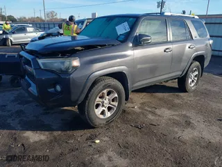 2018 Toyota 4Runner SR5 with VIN JTEBU5JR5J5555887, listed as a IAAI auction lot 41352408 with 157,829 mi miles. Bid and sale history available at carsss.com. Image 17.