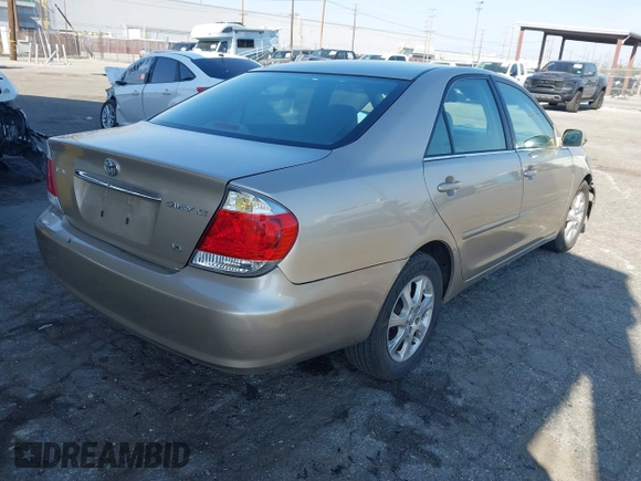 2005 Toyota Camry LE with VIN 4T1BF32K55U592479, listed as a IAAI auction lot 41974250 with 184,767 mi miles and . Bid and sale history available at DreamBid. Image 4.