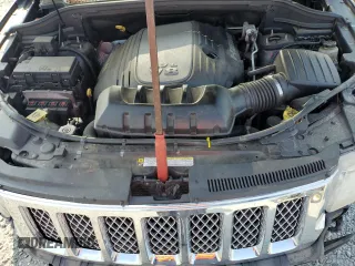 2011 Jeep Grand Cherokee Overland Summit with VIN 1J4RR6GT3BC686143, listed as a Copart auction lot 59218685 with 155,059 mi miles and Salvage title. Bid and sale history available at DreamBid. Image 12.