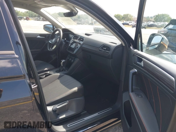 2024 Volkswagen Tiguan with VIN 3VVTB7AX6RM218502, listed as a IAAI auction lot 42063327 with 7,280 mi miles and . Bid and sale history available at DreamBid. Image 5.