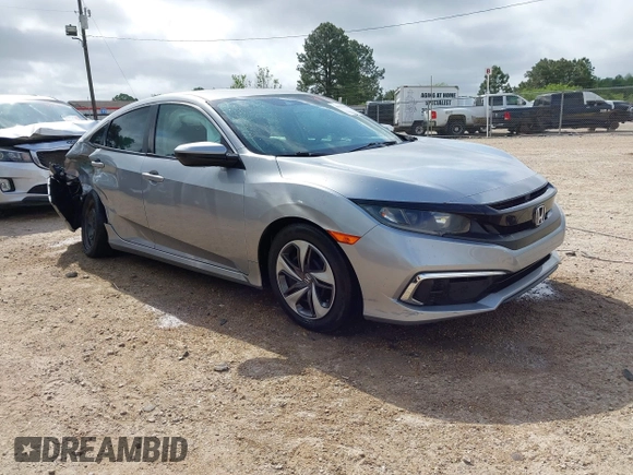 2019 Honda Civic LX with VIN 19XFC2F60KE043806, listed as a IAAI auction lot 41915894 with 123,141 mi miles and . Bid and sale history available at DreamBid. Image 1.