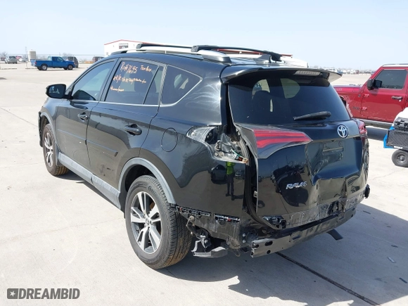 2016 Toyota RAV4 XLE with VIN 2T3WFREV9GW292772, listed as a IAAI auction lot 41727898 with 117,922 mi miles. Bid and sale history available at carsss.com. Image 3.