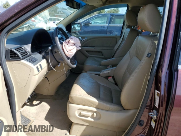2010 Honda Odyssey EX-L with VIN 5FNRL3H60AB041353, listed as a Copart auction lot 52801315 with 120,253 mi miles and Salvage Title. Bid and sale history available at DreamBid. Image 7.