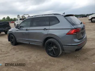 2023 Volkswagen Tiguan SE R-Line Black z VIN 3VVCB7AX6PM013498, wystawiony jako Copart lot #55750805 z przebiegiem 31 190 mil mil oraz Szkoda całkowita • Salvage title. Historia ofert i sprzedaży dostępna na DreamBid. Obrazek 2.