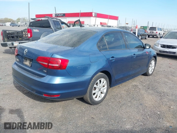 2015 Volkswagen Jetta Sedan 1.8T SE with VIN 3VWD17AJ0FM284070, listed as a IAAI auction lot 41853883 with 194,725 mi miles. Bid and sale history available at carsss.com. Image 4.